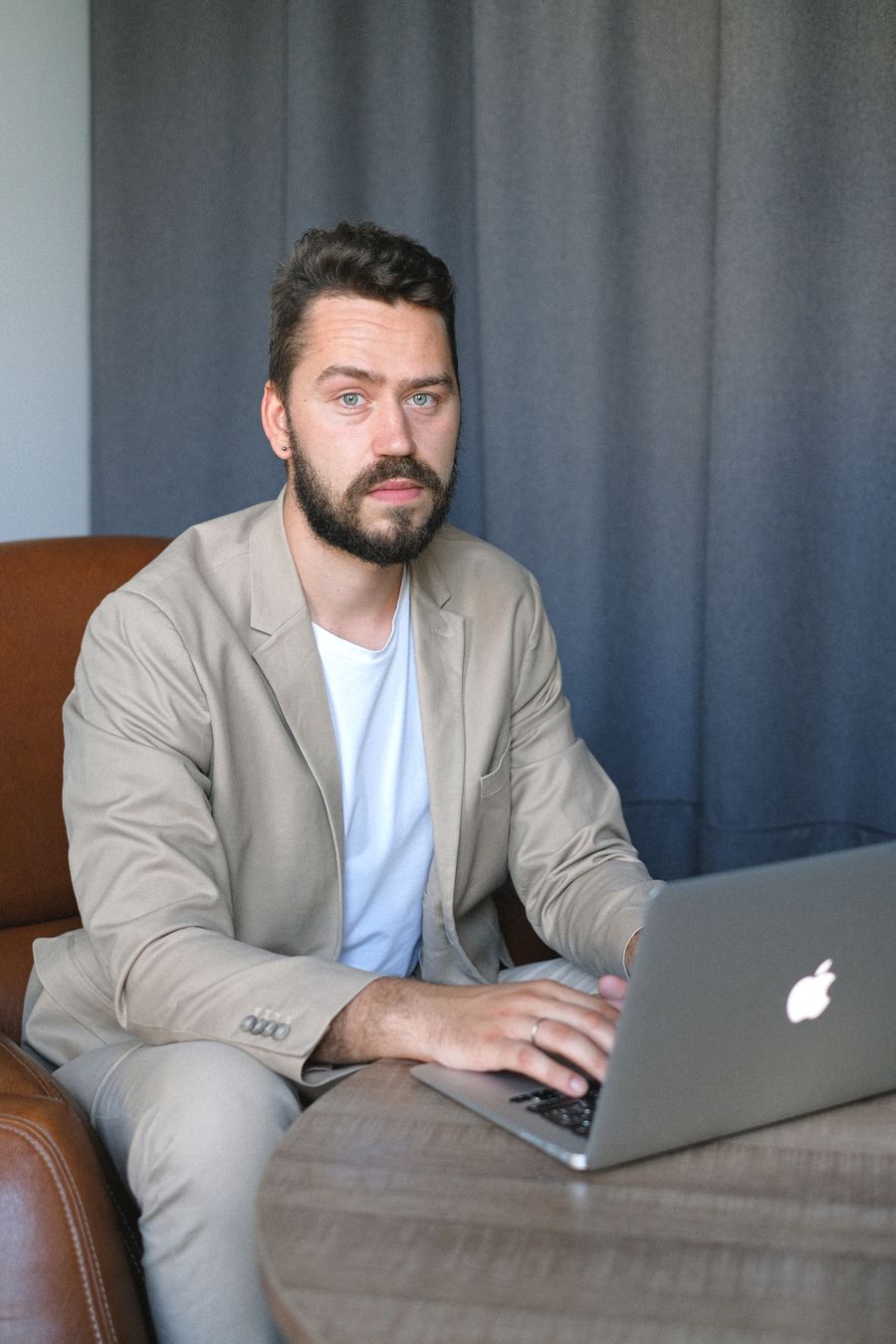 Young business owner editing his company's digital presence